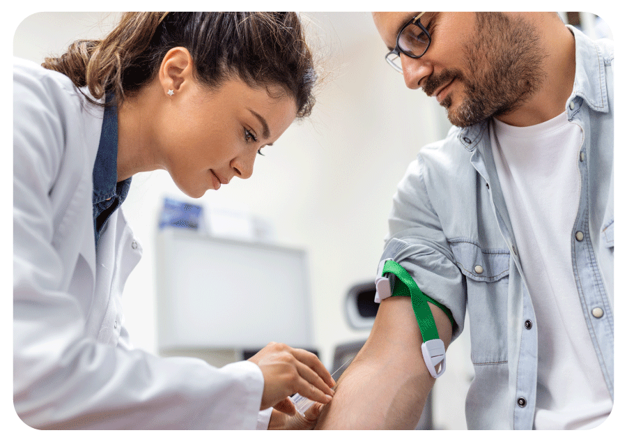 Doctor showing a patient results on a tablet.