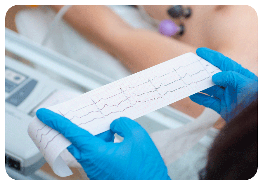 Healthcare professional reviewing medical scans.